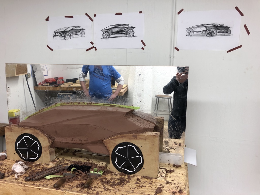 Clay model in progress — full-scale form development